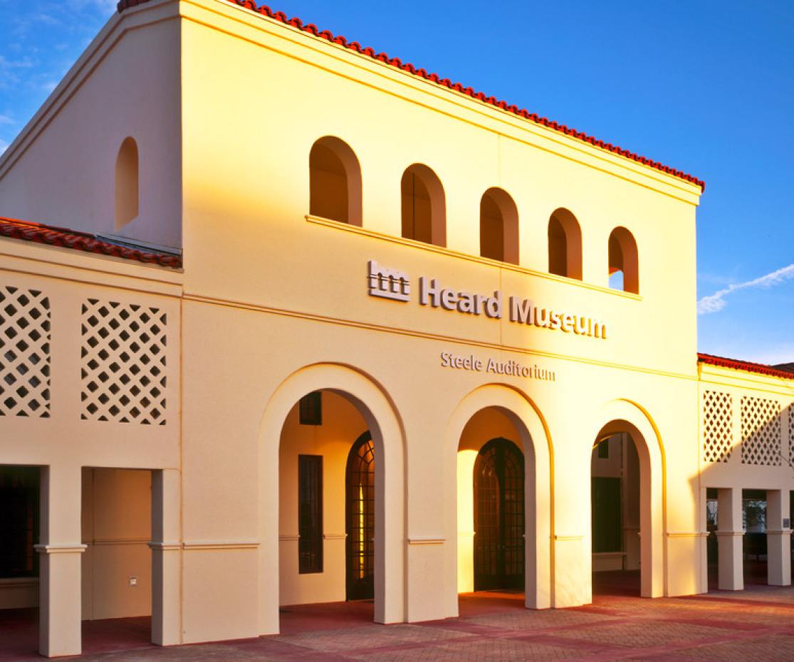 The sun sets on the front entryway of the Heard Museum in Phoenix, Arizona.
