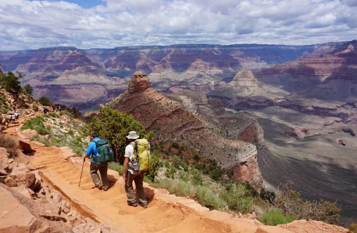 Two men hiking down the South Kaibab Trail in Grand Canyon National Park