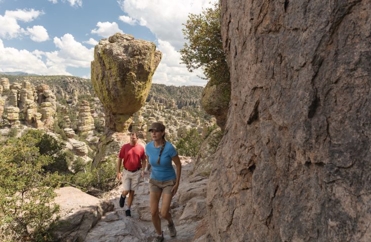 Two people hiking through Chiricahua National Monument